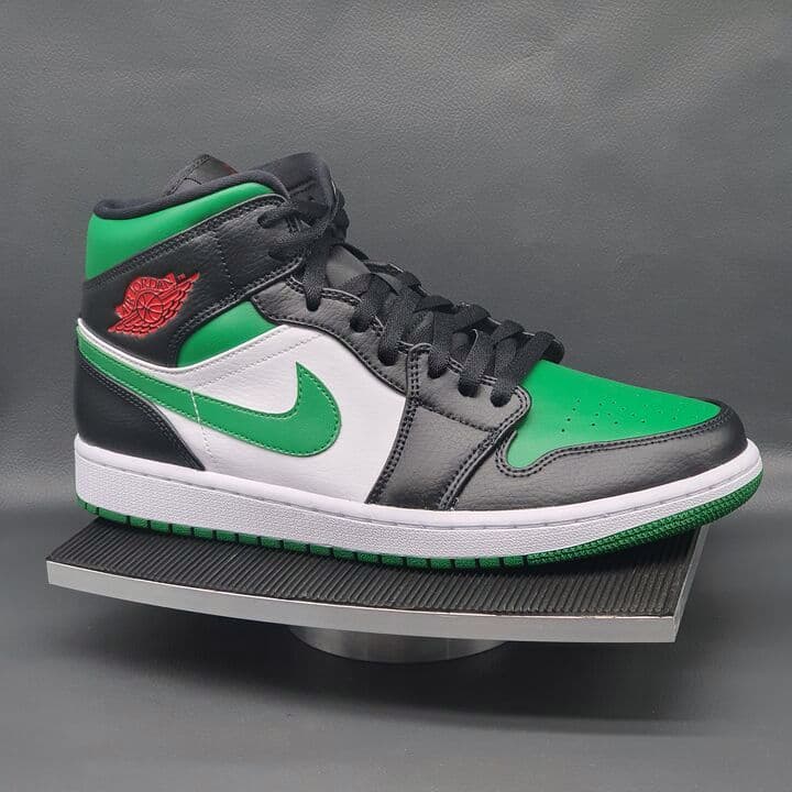 Air Jordan 1 Mid in Grün und Schwarz